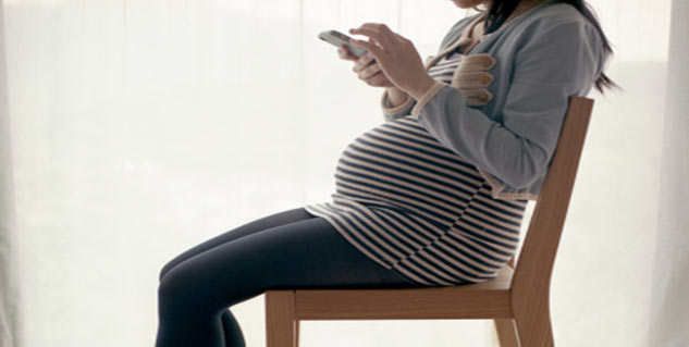 pregnant lady sitting position