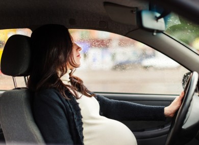 pregnant woman driving car