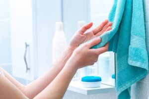 use towel after washing hands
